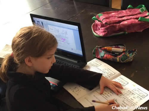 In Copenhagen, as in many Chabad centers around the world, children keep up with their studies and their peers around the world as part of an international online school.
