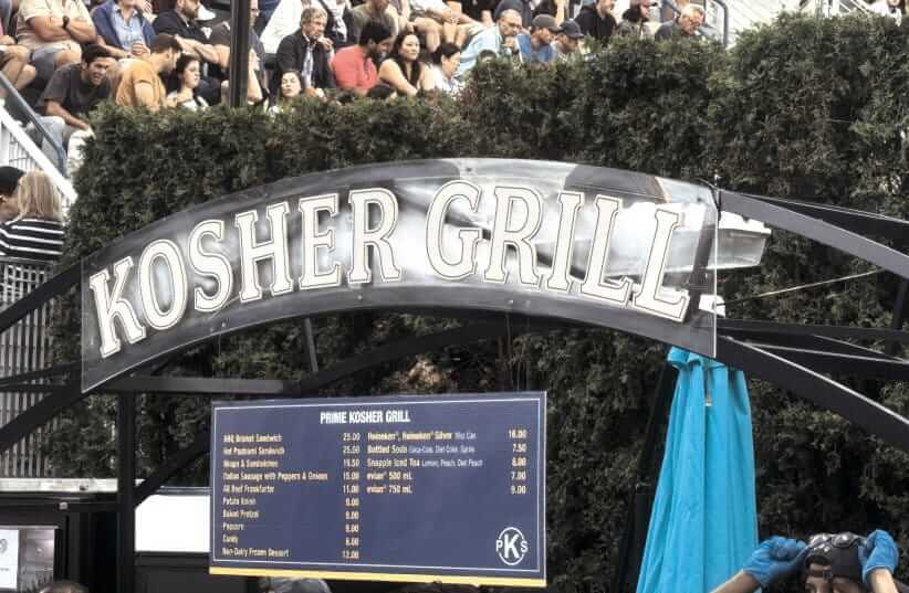 BETWEEN ISRAEL-BORN Canadian Denis Shapovalov (left) and the always-popular kosher food stand and minyan announcements (right) on the grounds of the USTA Billie Jean King National Tennis Center, the US Open definitely has its Jewish and Israeli fans covered. (credit: Howard Blas/Courtesy photo)